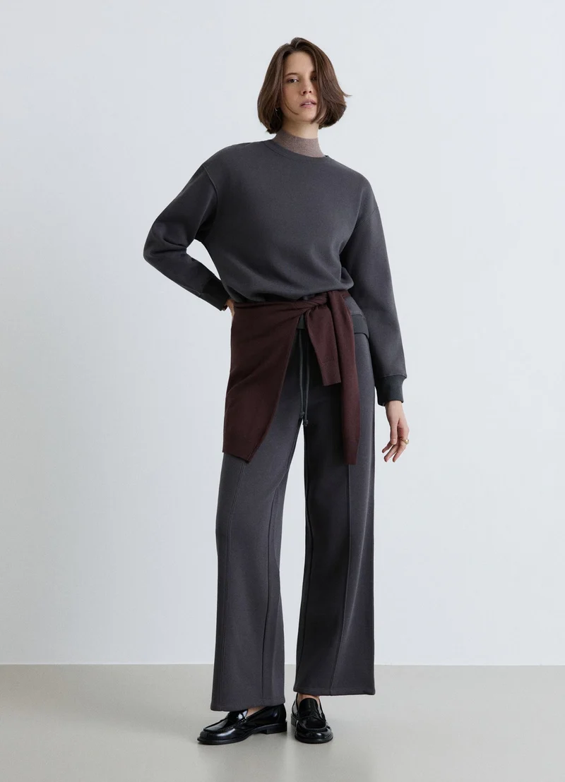 Pantaloni palazzo ginnici con coulisse